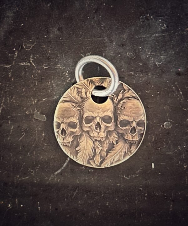 Alternative view of Pendant Skull and Feathers