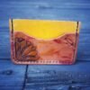 Granite Wallet with marbled dye work and carved art, yellow and orange with a sunflower