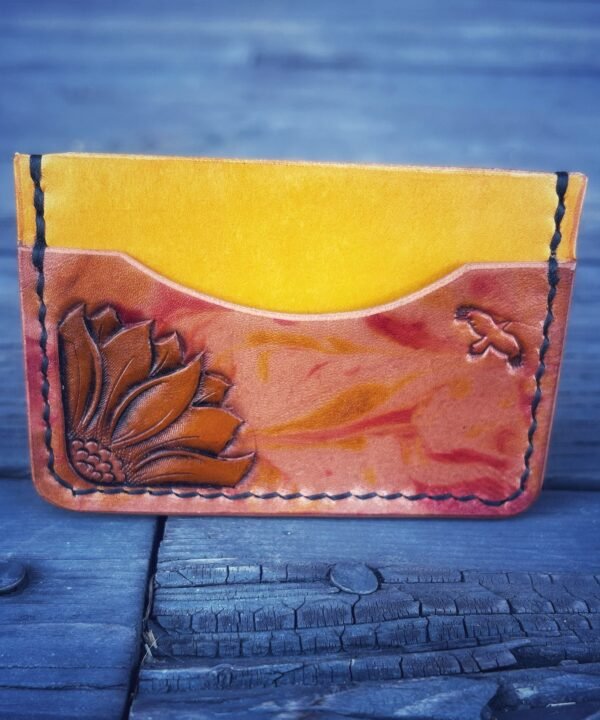 Granite Wallet with marbled dye work and carved art, yellow and orange with a sunflower