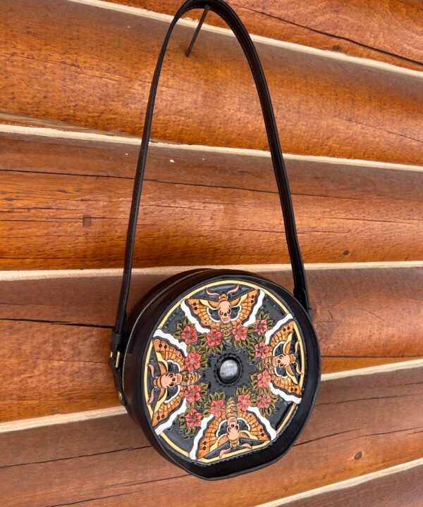 Yellowstone Purse with carved art, back with 4 moths and small red flowers