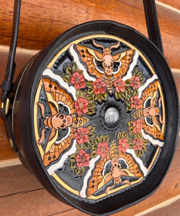 Yellowstone Purse with carved art, back with 4 moths and small red flowers