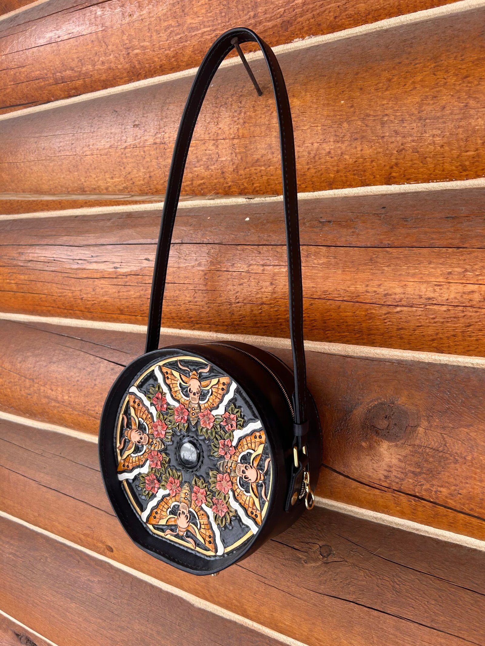 Yellowstone Purse with carved art, back with 4 moths and small red flowers