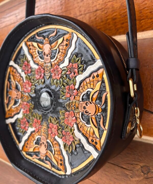 Yellowstone Purse with carved art, back with 4 moths and small red flowers