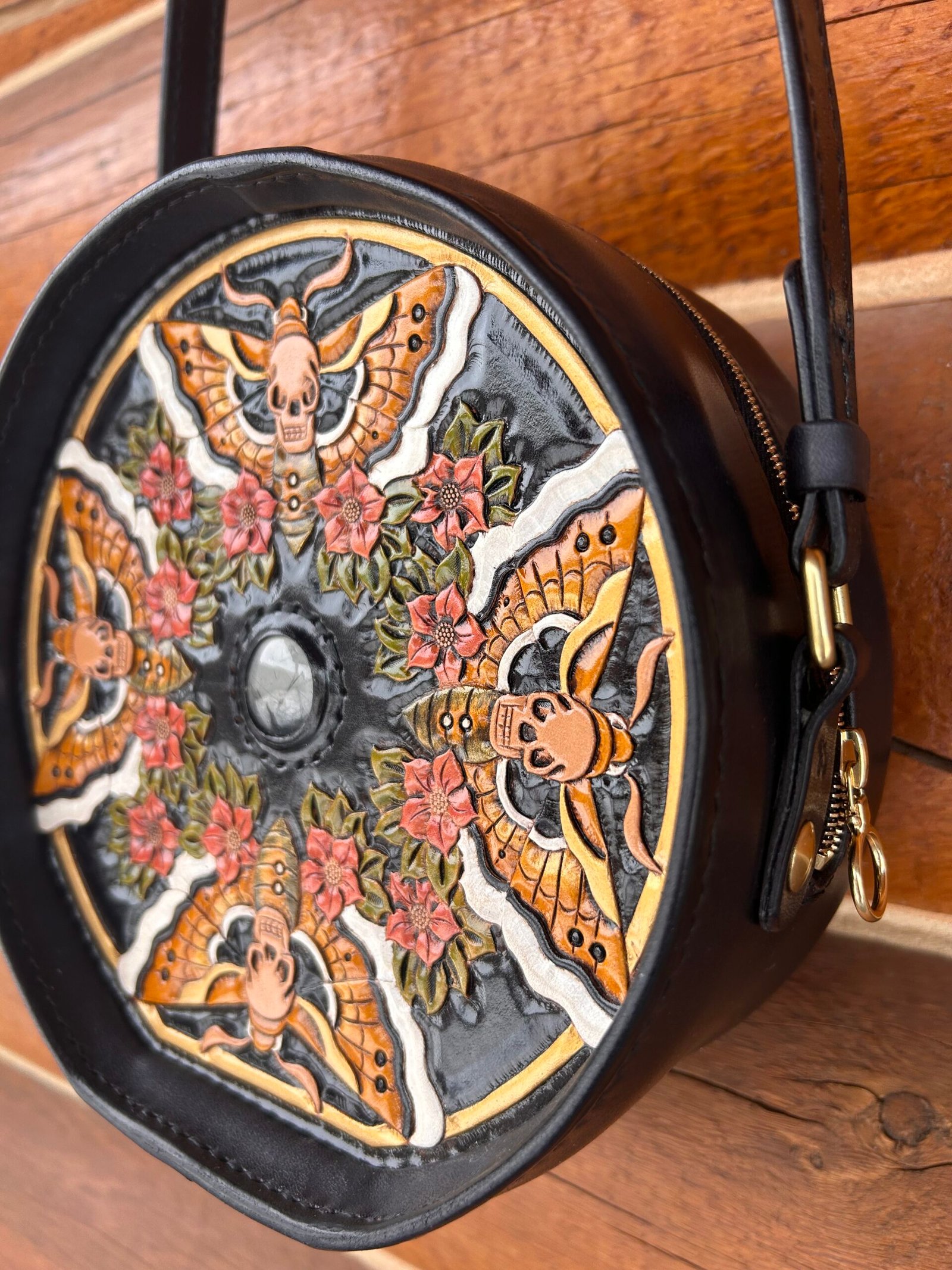 Yellowstone Purse with carved art, back with 4 moths and small red flowers