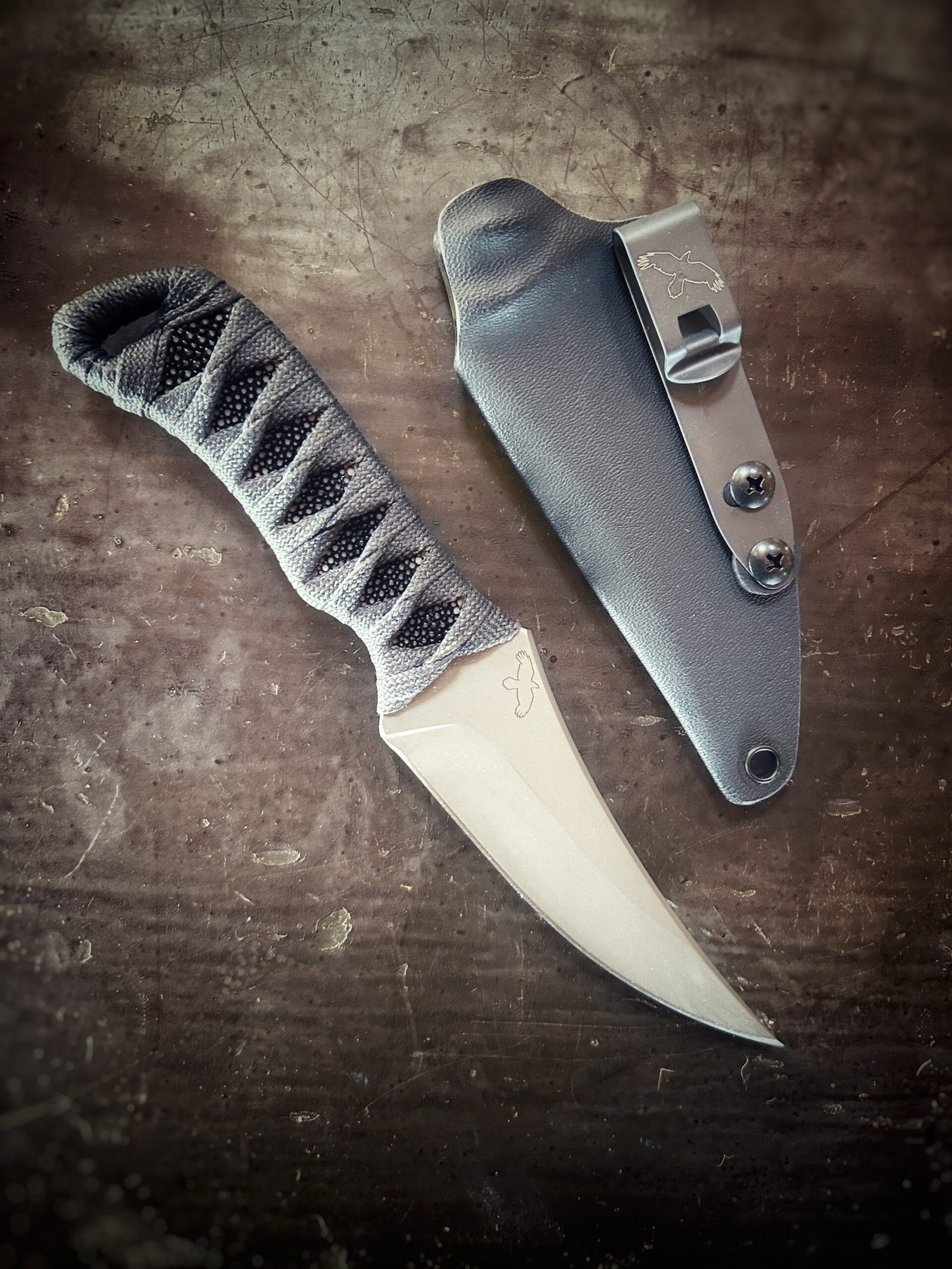 Erinyes with matte finish, polished stingray and slate gray wrap with sheath