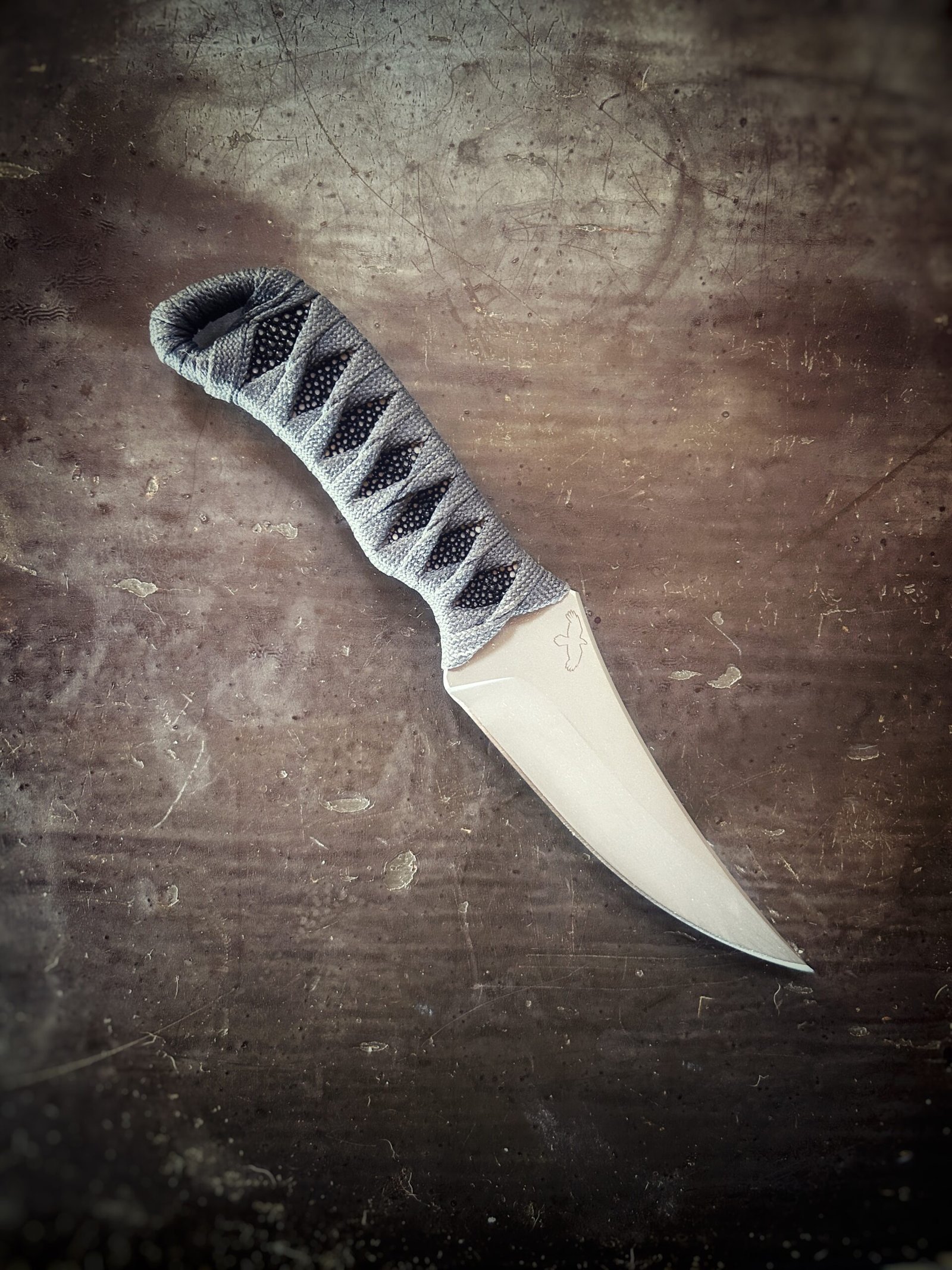 Erinyes with matte finish, polished stingray and slate gray wrap