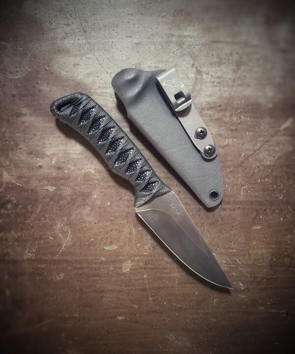 Anathema with polished stingray and black wrap with sheath
