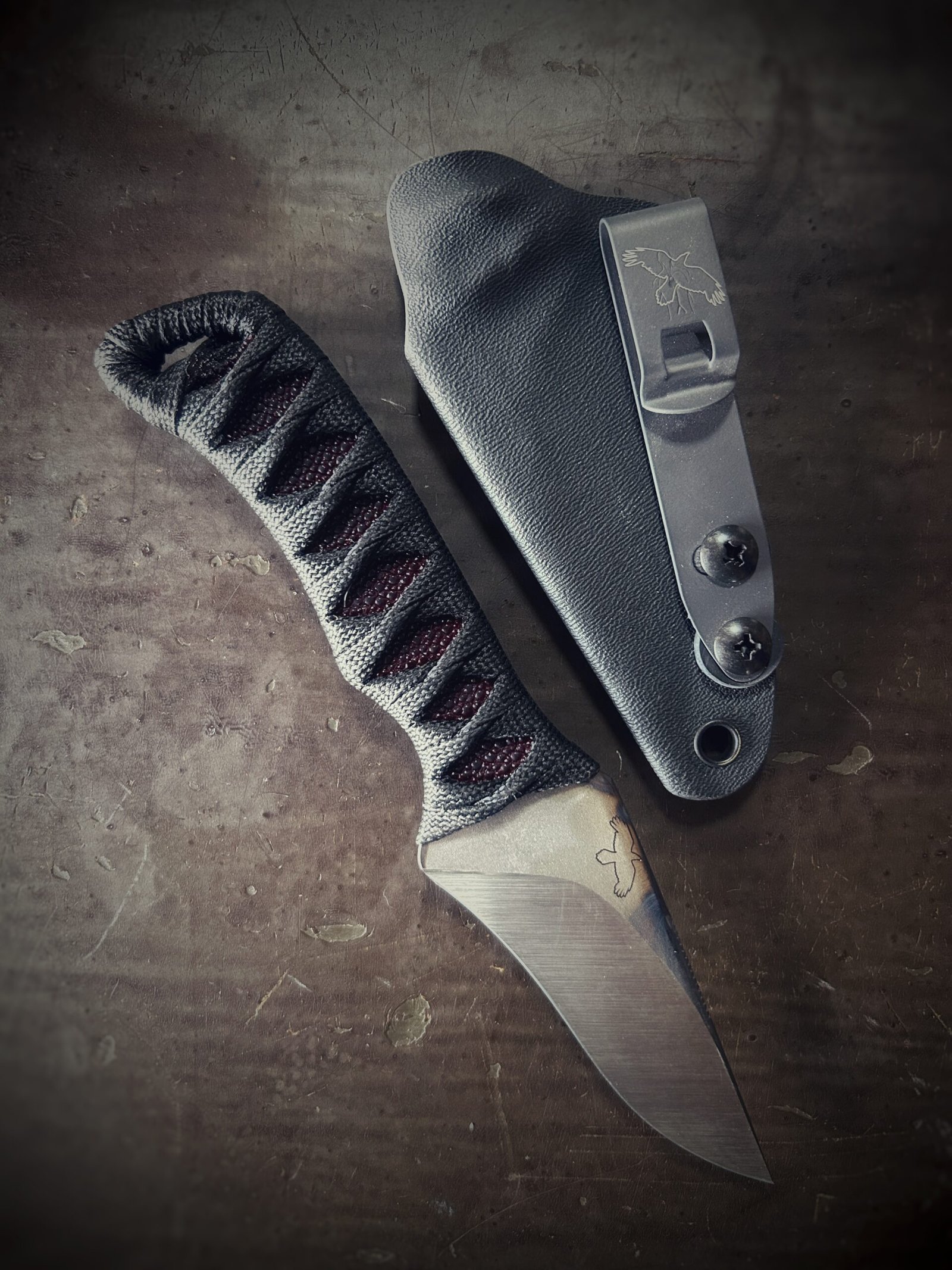 Wizard Finger with satin grind and oxblood stingray and black wrap with sheath