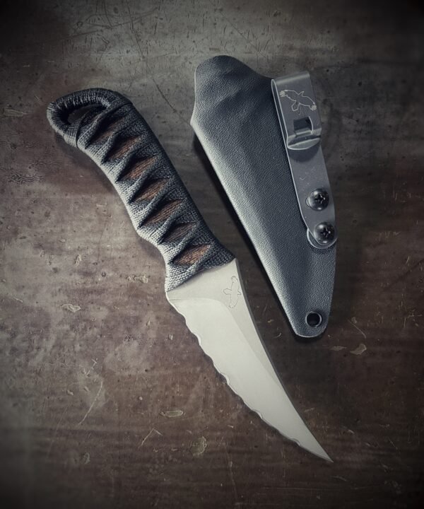 Bidirectional serrated Erinyes with matte blade and burnt jute and black wrap with sheath