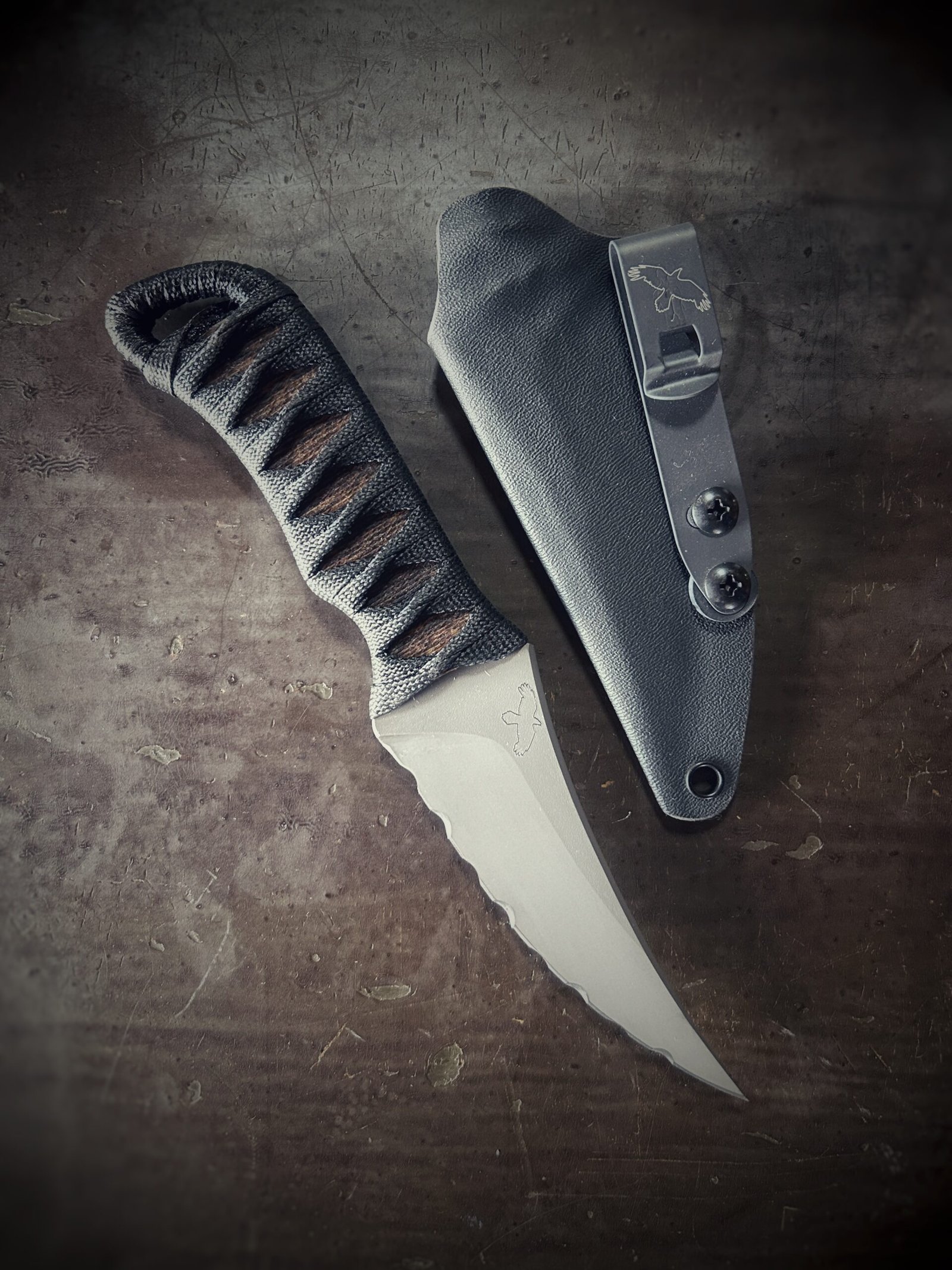 Bidirectional serrated Erinyes with matte blade and burnt jute and black wrap with sheath