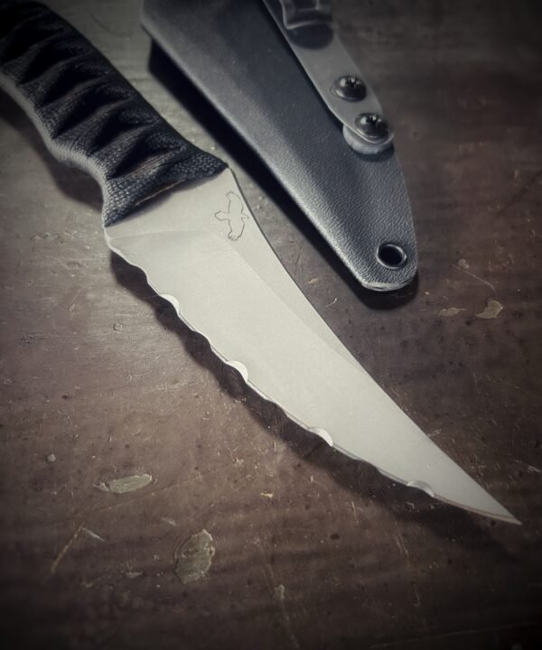 Bidirectional serrated Erinyes with matte blade and burnt jute and black wrap