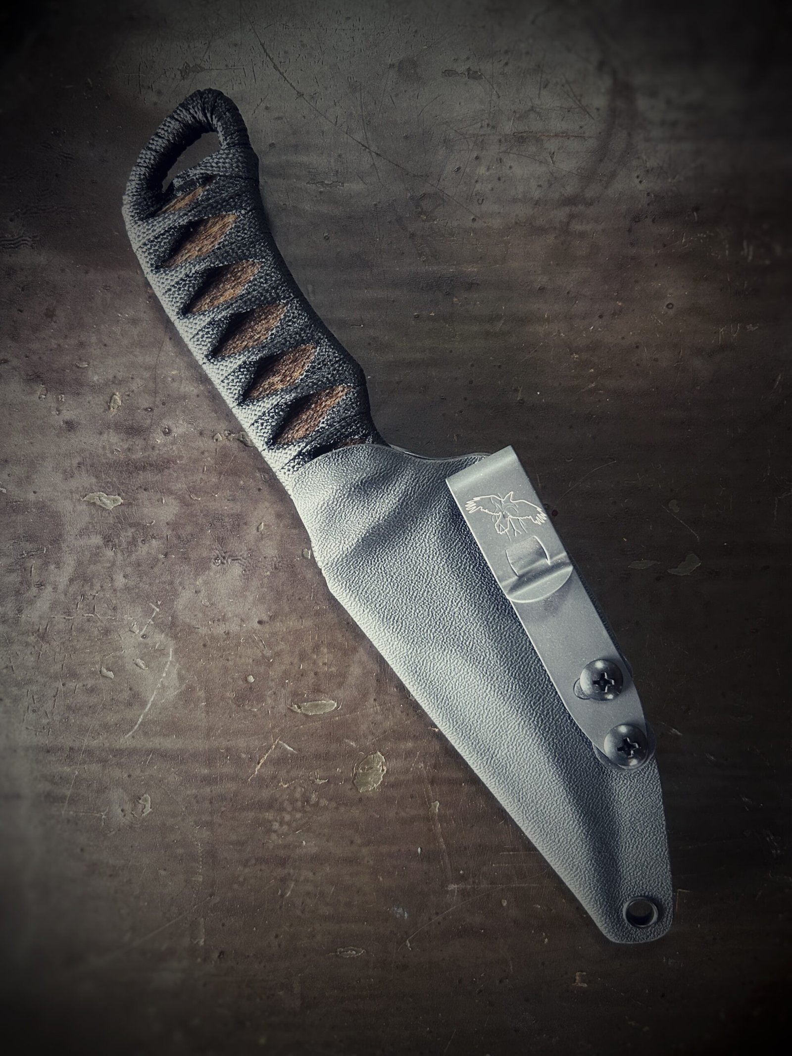DE Erinyes with natural heat treat blade and burnt jute and black wrap in sheath
