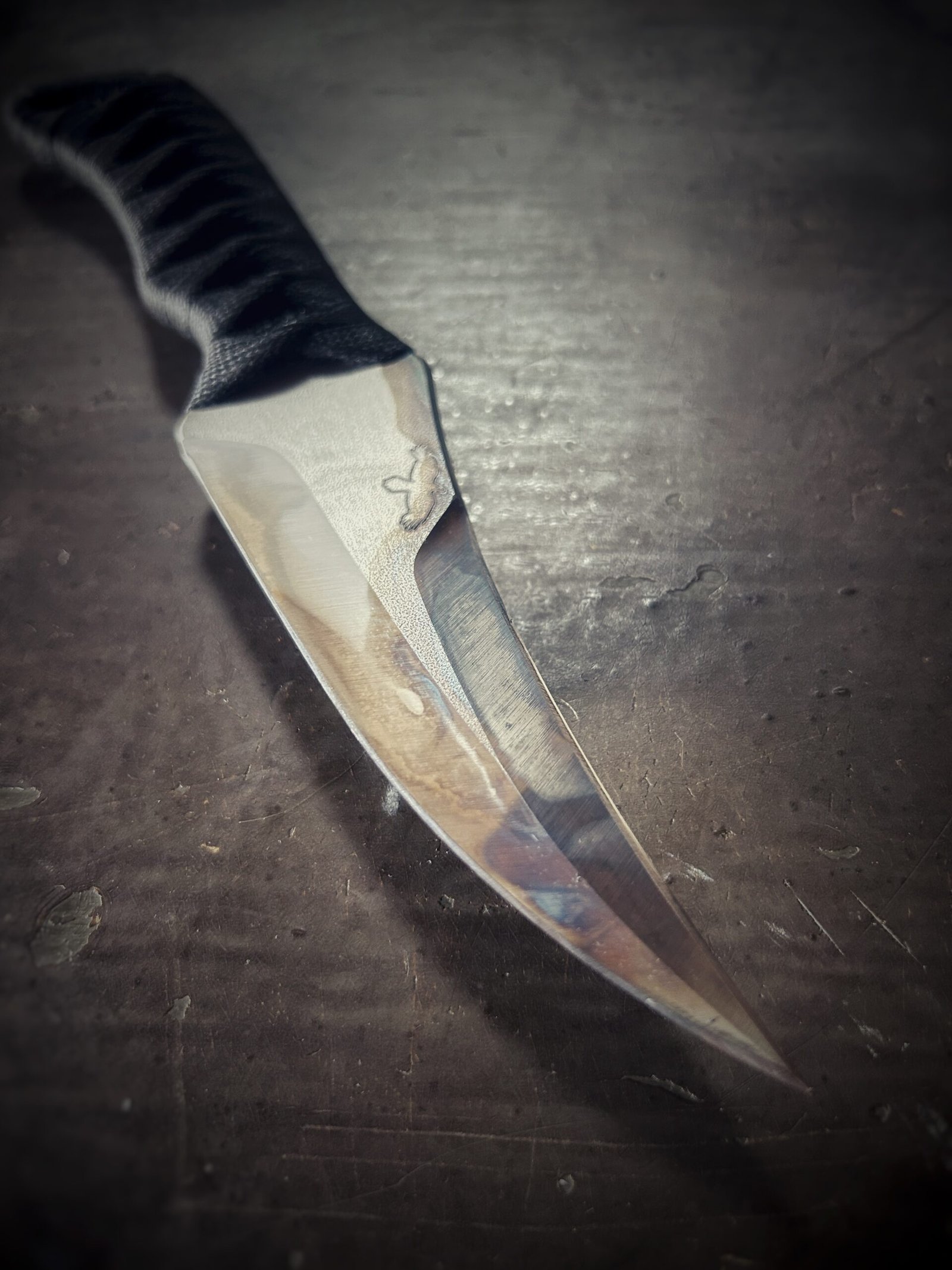DE Erinyes with colorful heat treat blade and black wrap