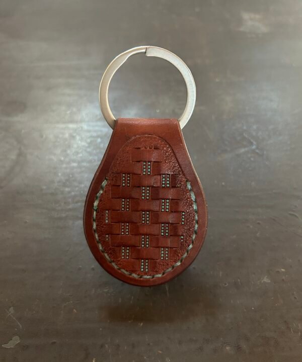 Carved AirTag Fob with brown and turquoise basketweave pattern