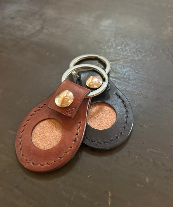 Back of Carved AirTag Fob, showing stainless steel snap and keyring