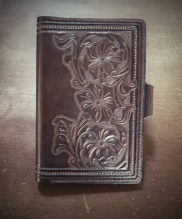 Notebook with 3 flowers in a Western floral design on a black background