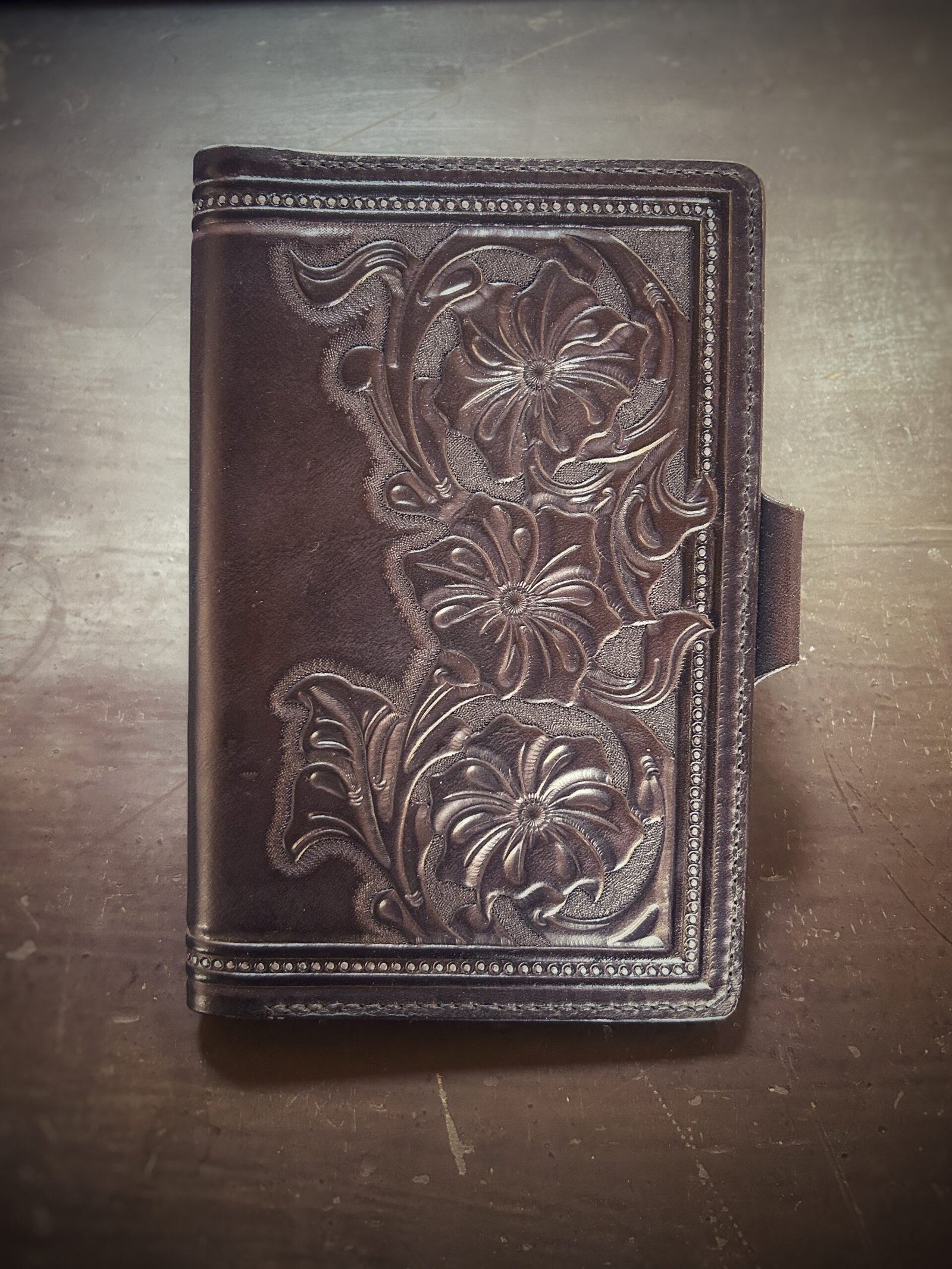 Notebook with 3 flowers in a Western floral design on a black background