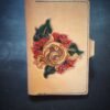 Notebook with 3 flowers in a Western floral design on a natural tan background