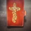 Notebook with 1 flower and Western floral cross design on a brown background