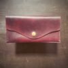 Madison wallet exterior, marbled oxblood and black