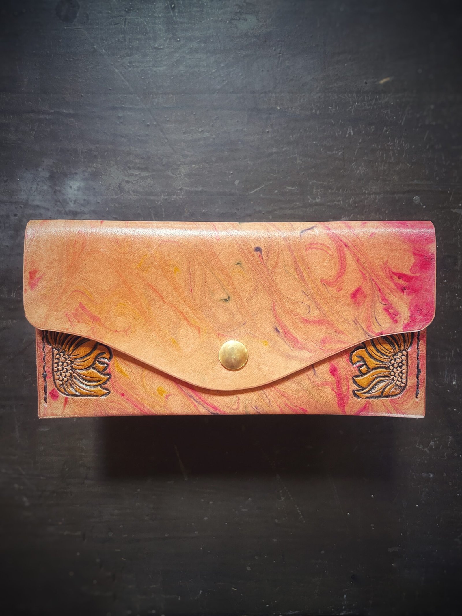 Madison wallet exterior, 2 sunflowers with a rainbow marbled background