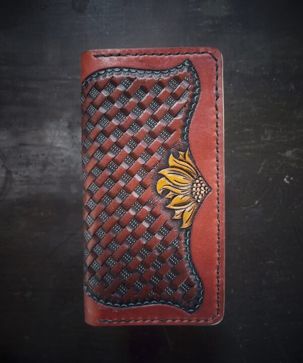 Boulder wallet exterior, brown basketweave background and turquoise accents with 2 sunflowers