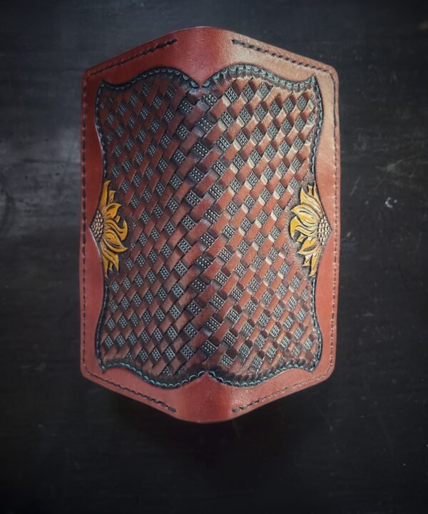 Boulder wallet exterior, brown basketweave background and turquoise accents with 2 sunflowers