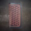 Boulder wallet exterior, red and black dyework over skull basketweave