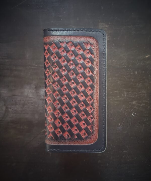 Boulder wallet exterior, red and black dyework over skull basketweave