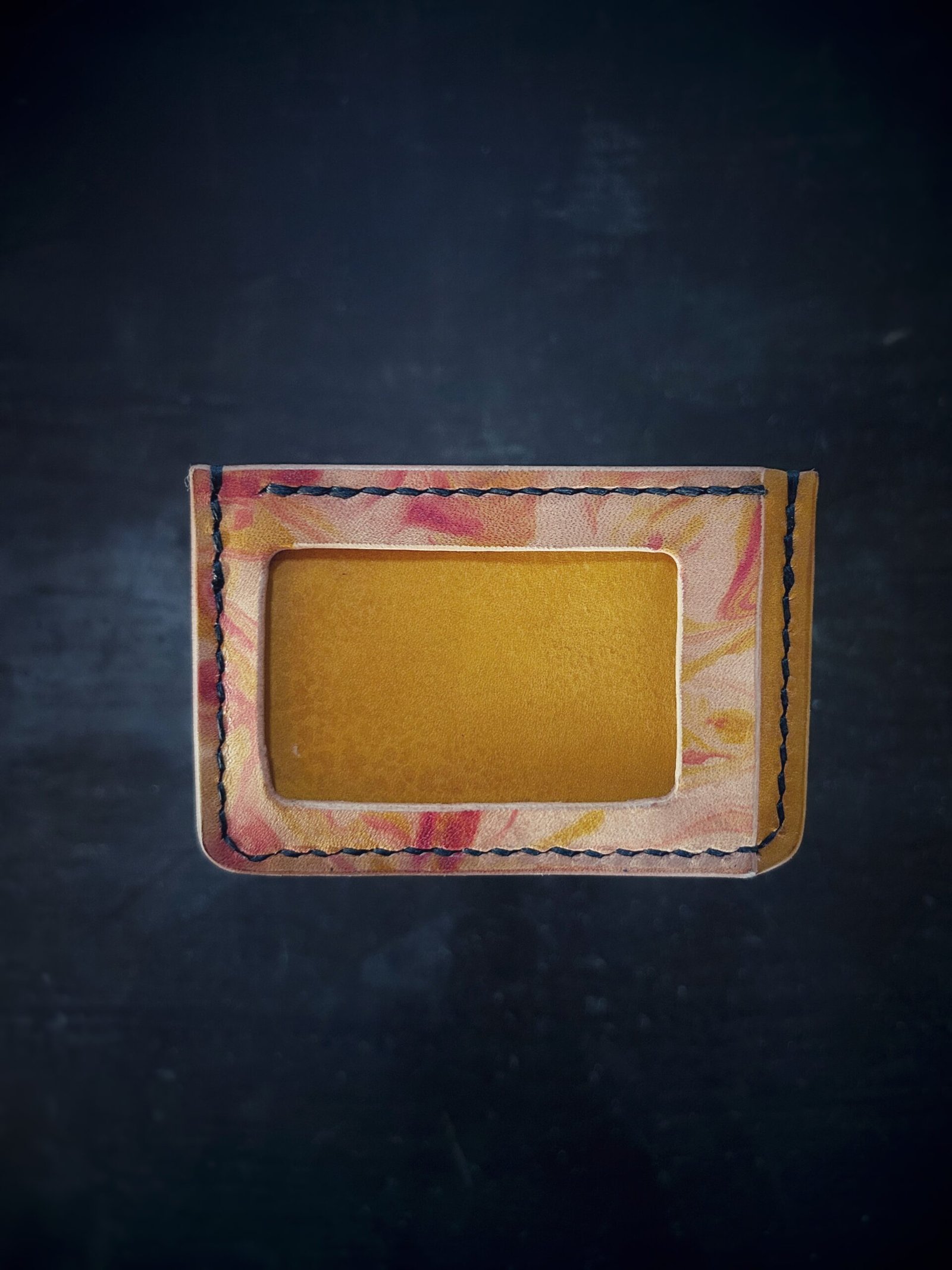 Granite wallet, back pocket, in yellow and yellow and red marbling accents