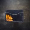 Granite wallet, sunflower on left side with background in black