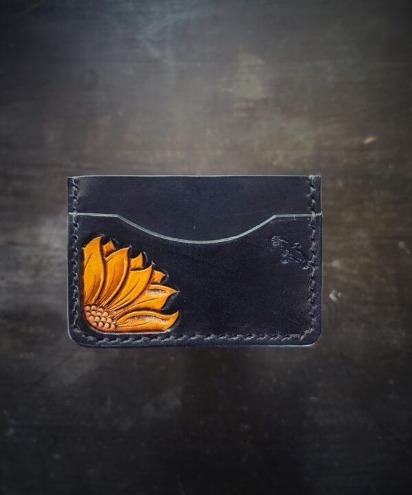 Granite wallet, sunflower on left side with background in black