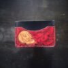 Granite wallet, skull on left side and backgound is red and black marbling