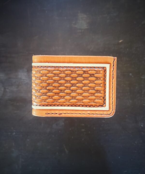 Mission wallet, natural tan and brown basketweave and a white boarder.