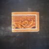 Mission wallet, natural tan and brown basketweave with western scrolls and a white boarder.