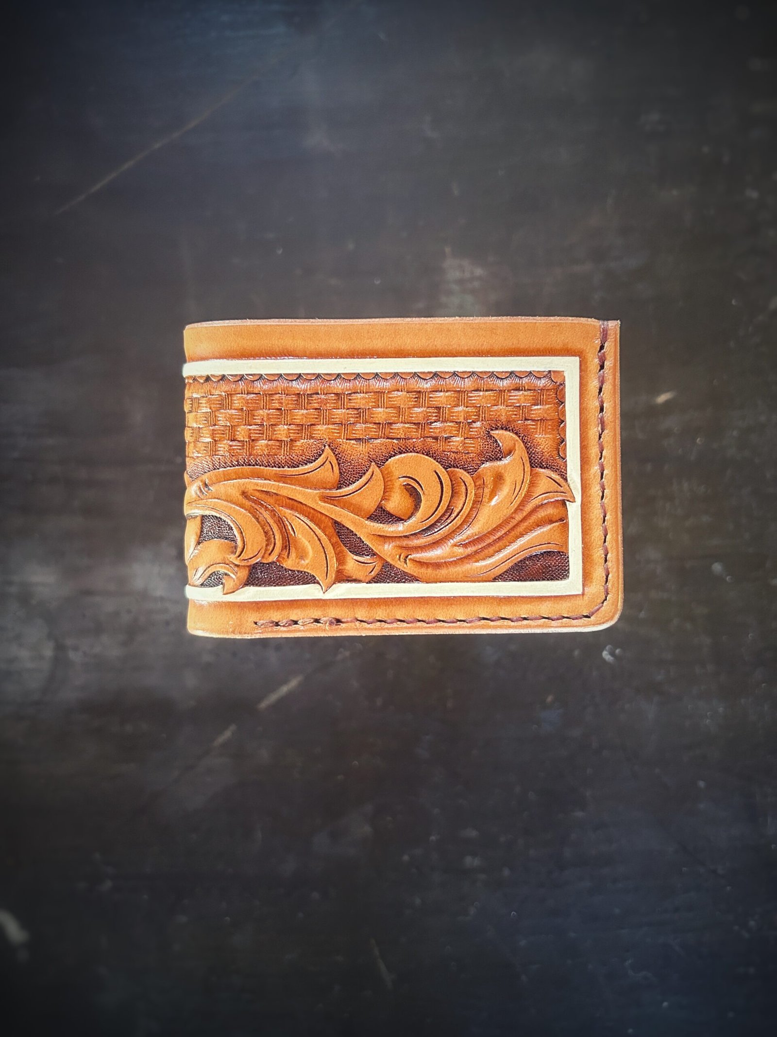 Mission wallet, natural tan and brown basketweave with western scrolls and a white boarder.
