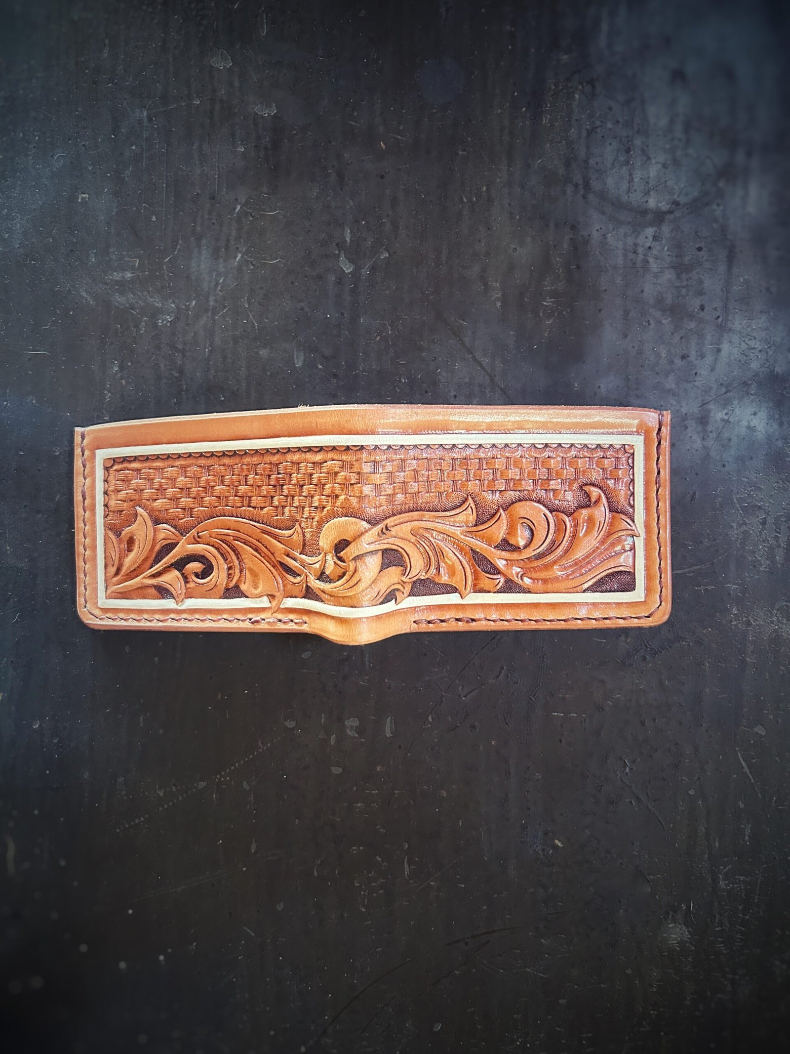 Mission wallet, natural tan and brown basketweave with western scrolls and a white boarder.