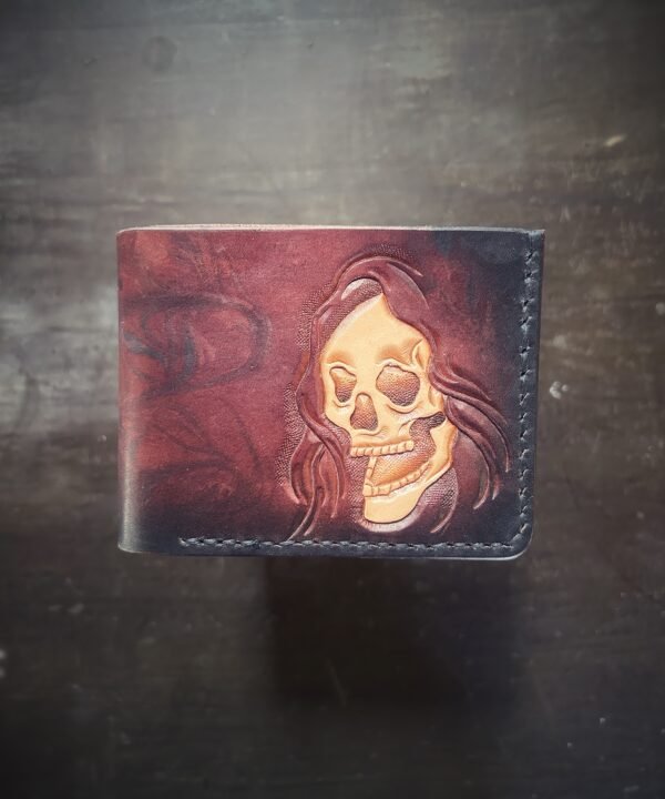 Mission wallet, brown and black marbling and a reaper skull.