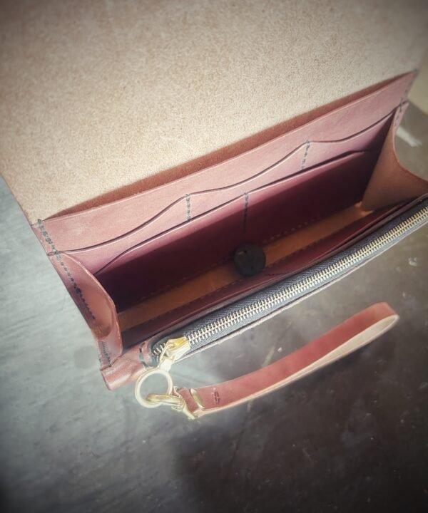 Bitterroot Wallet interior, brown and brass hardware