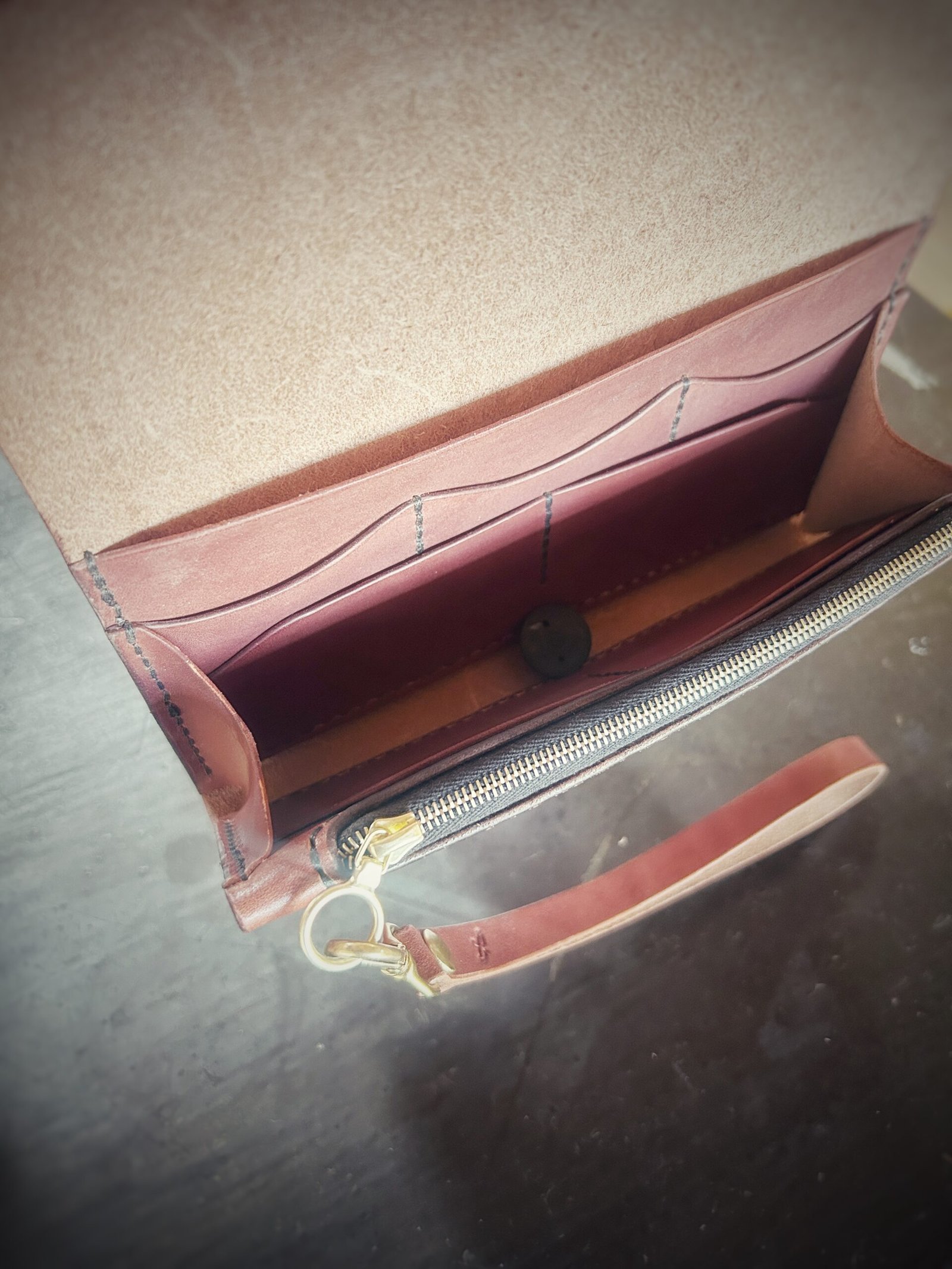 Bitterroot Wallet interior, brown and brass hardware
