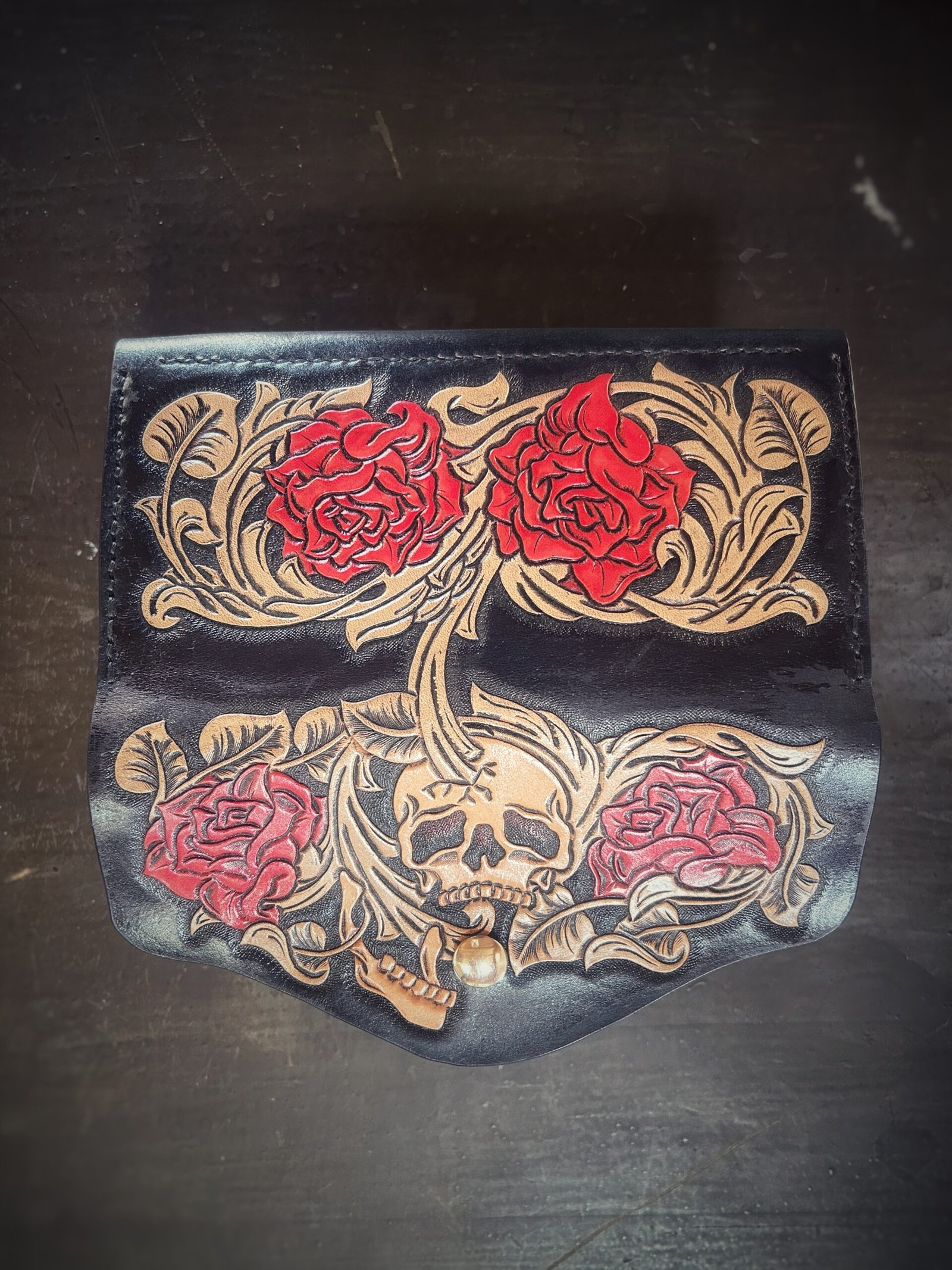 Bitterroot Wallet, Skull and Roses with black background with tan and red accents