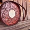 Yellowstone round bag, brown floral with tan and cream hair on hide inset.