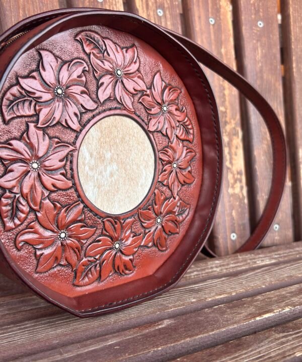 Yellowstone round bag, brown floral with tan and cream hair on hide inset.